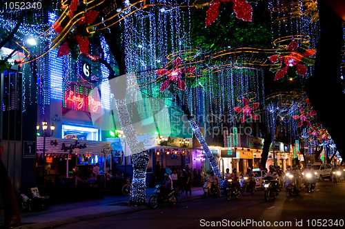 Image of Street and shops decorated for Christmas in Vietnam