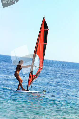 Image of windsurf - surfer girl