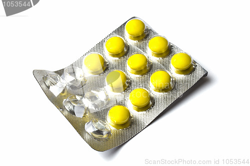 Image of Yellow Pills isolated on white 