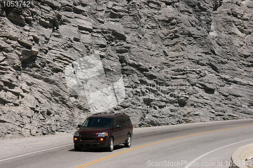 Image of Mountain road and a car