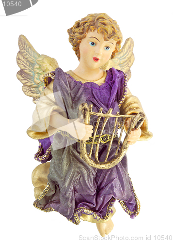 Image of A Christmas ornament of an angel holding a harp. Isolated over white background. (14MP camera)