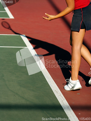 Image of Girl playing tennis