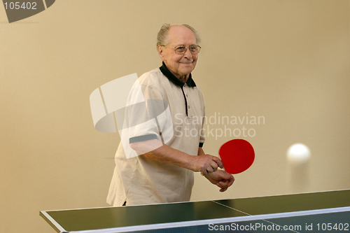 Image of Old man playing ping pong