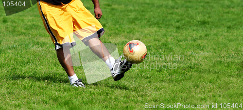 Image of Man playing soccer