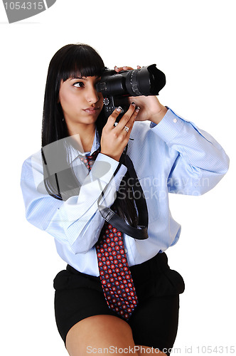 Image of Girl taking pictures.