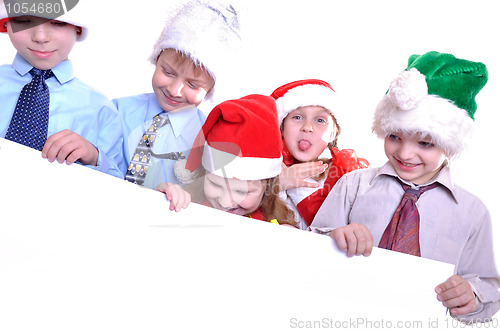 Image of Christmas children with a banner