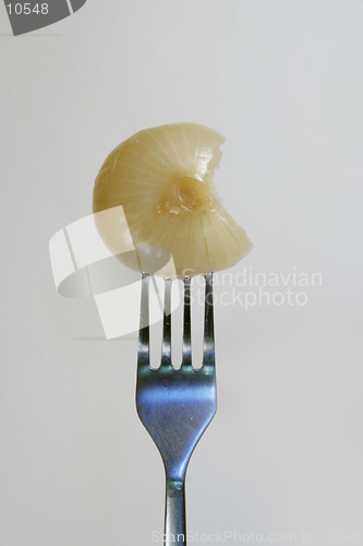 Image of A pickled onion with a bite out of it