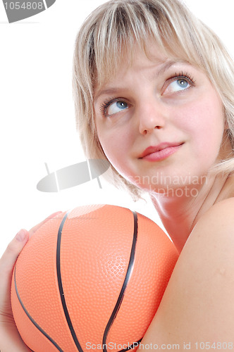 Image of beautiful blond woman with a ball