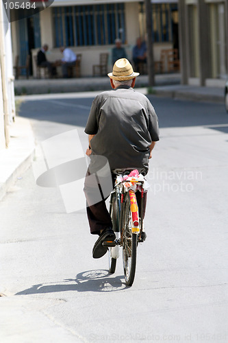 Image of old man on bicycle