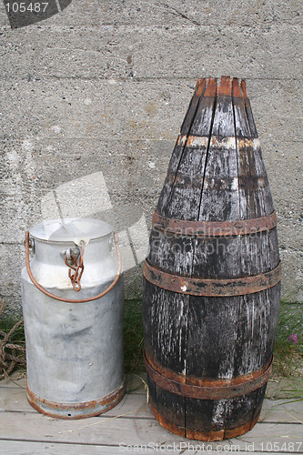 Image of Barrel and milk container