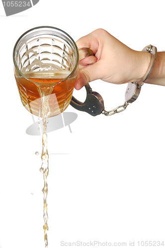 Image of pouring beer away