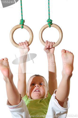 Image of child on gymnastic rinhs