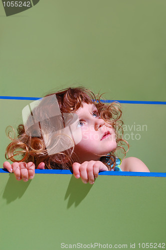 Image of little girl's portrait on green