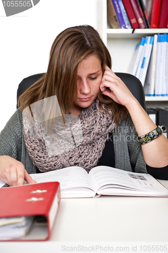 Image of Young woman studying