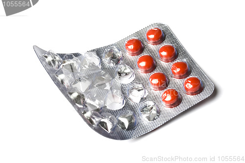 Image of red pills isolated on white 