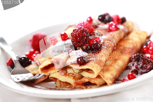 Image of Crepes filled with chocolate and berries