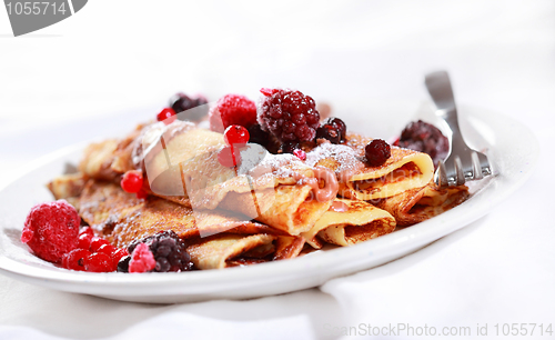 Image of Crepes filled with chocolate and berries