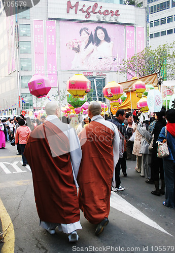 Image of Monks carrying lanterns