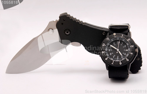 Image of knife and watch