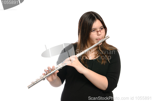 Image of Teenager Playing Flute