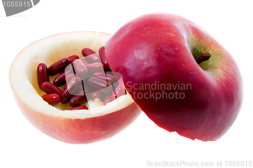 Image of Apple with medicines