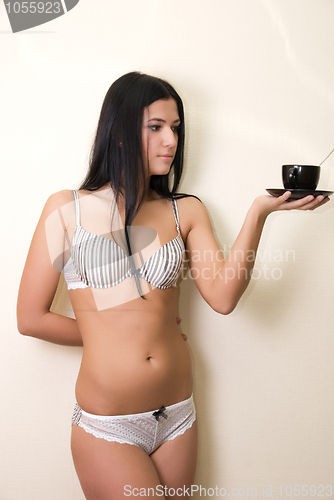 Image of Sexy girl in lingerie with coffee cup