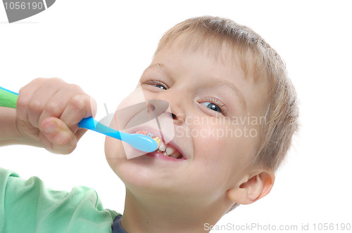 Image of child cleaning teeth