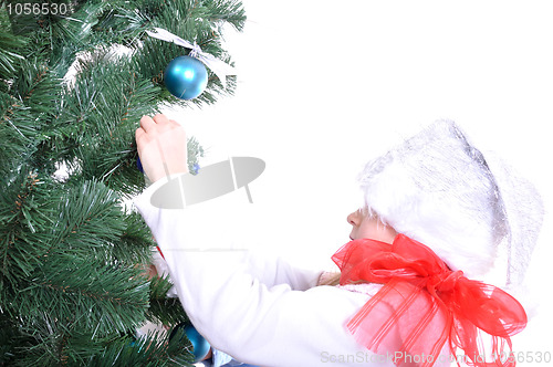 Image of Christmas tree and child