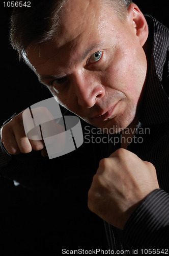 Image of angry man boxing