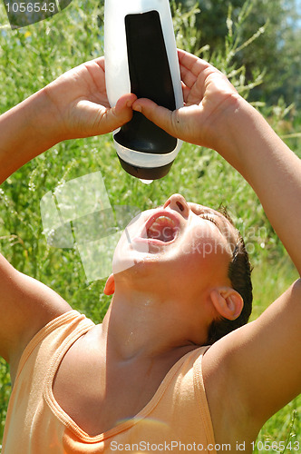 Image of thisrty child drinking water