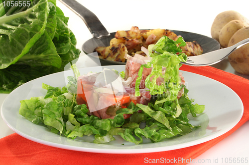 Image of Fried potatoes with meat jelly