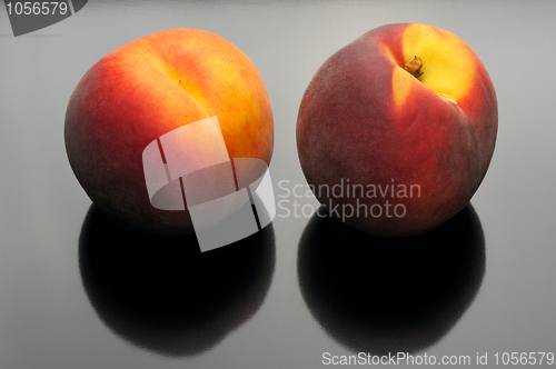 Image of Peaches on a black background.