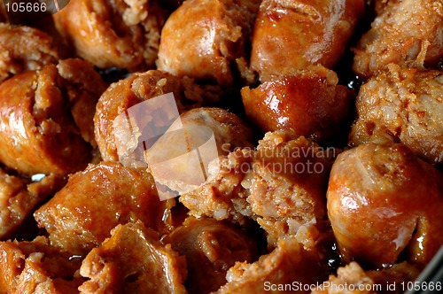 Image of italian sausage frying