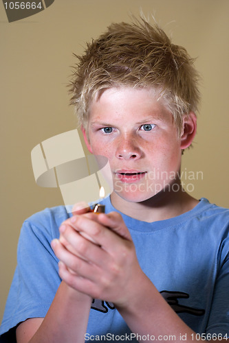 Image of Boy with lighter