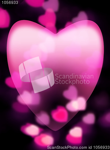 Image of Pink heart fades into dark background with out-of-focus heart-sh