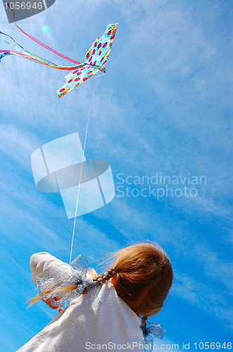 Image of child flying a kite