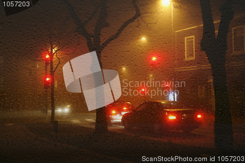 Image of Wet foggy night in city