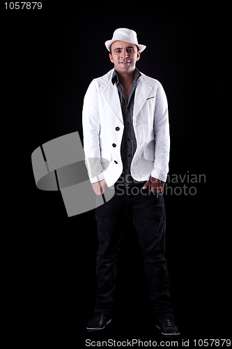 Image of Portrait of a happy man with his white hat and coat