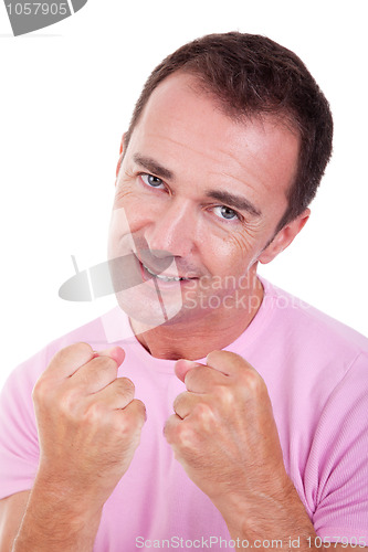 Image of smiling man punching fist 