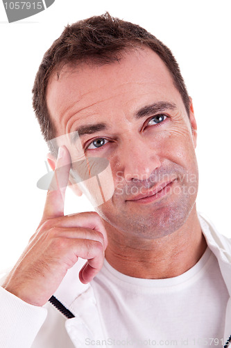 Image of Portrait of a middle-age man thinking, looking up,