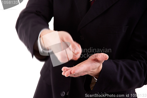 Image of detail of a businessman making the gesture of a payment