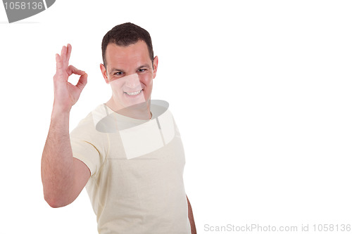 Image of handsome man with arm raised in ok sign