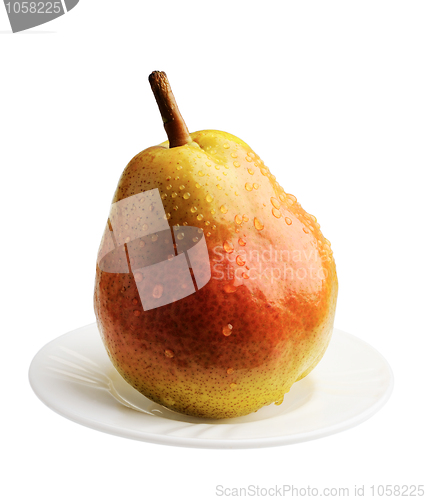 Image of Pear on a white plate, isolated