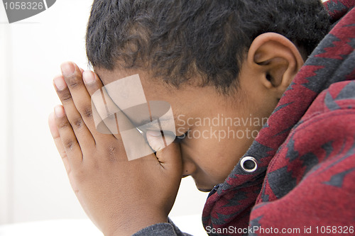 Image of A Young kid praying