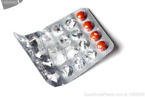 Image of  red pills isolated on white