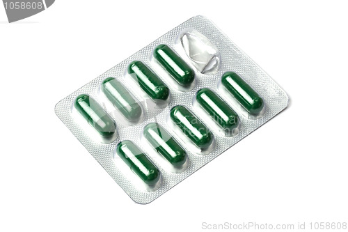 Image of Green capsules packed in blister