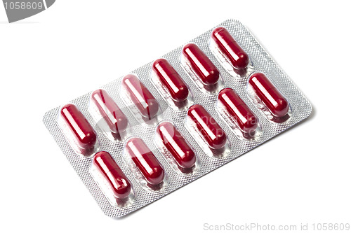 Image of Red capsules packed in blister