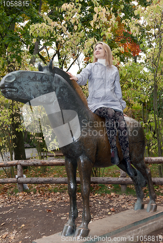 Image of Girl on the brass horse monument