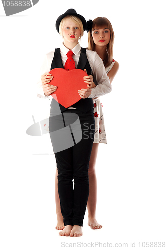 Image of Two girls with red cardboard heart