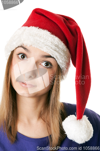 Image of Beautiful girl in red Santa hat